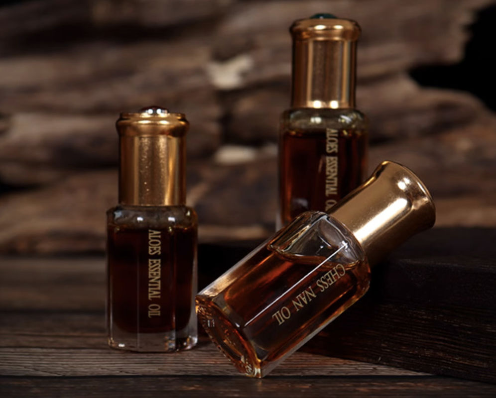 Calidad Calma los nervios y ayuda a dormir Agarwood Oud Aceite esencial China Nha Trang Hainan Kynam fábrica