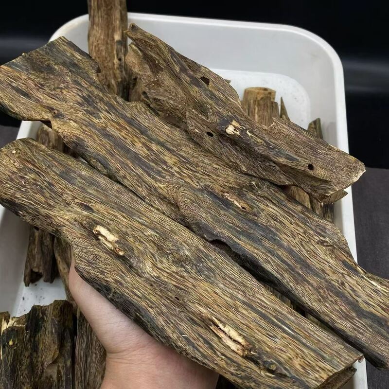 Quality supply of natural OUD Agarwood resin and wood pieces suitable for perfume industry incense production and herbal remedies factory