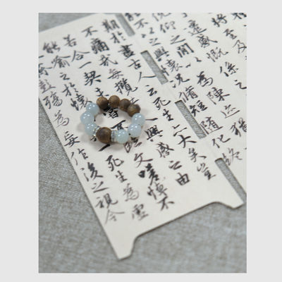Qualità Agarwood Jade Ring Pietra naturale Effetto calmante Purificazione dell'aria fabbrica