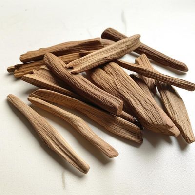 Quality Earthy Scent Profile Agarwood Chips Aromatic Raw Ingredients factory